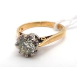 An 18ct Gold Single Stone Diamond Ring, the brilliant cut stone illusion claw set (finger size M) (