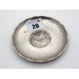 A Chinese Circular Dish, stamped character mark and "HC", of hammered finish inset to the centre