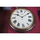 A Railway Style Clock, the mahogany circular case, with white enamel dial, with Roman numerals,