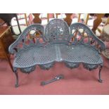 A XIX Century Style Painted Cast Iron Three Seater Garden Seat, with pierced back and seat, on