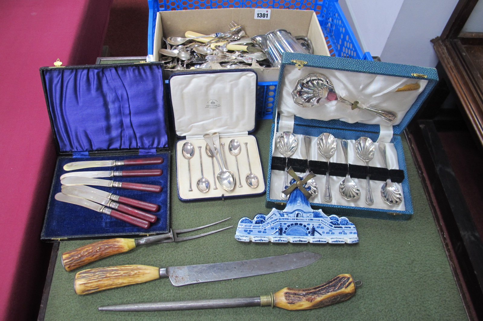 Cased Silver Spoons, two silver tea spoons, mixed cutlery, etc:- One Basket.