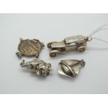 Novelty Charm Pendants, including vintage motor car (stamped "SIL", 3.7cm long); Mr Punch style head