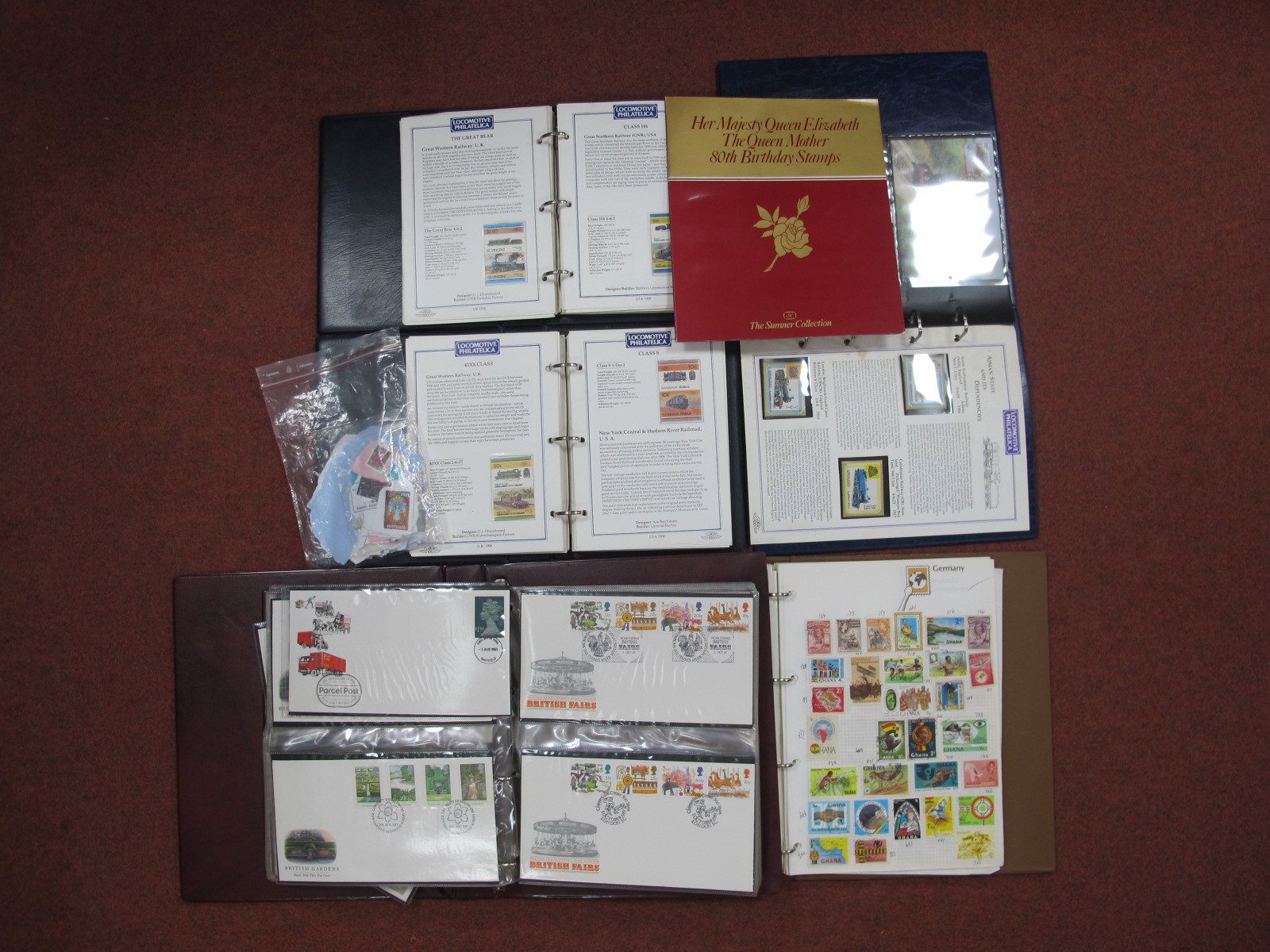 A Large Box Containing a Collection of G.B FDC's, mainly 1980's, an album of used World Stamps and