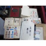 A Collection of Early Worldwide Stamps, housed in five junior albums and loose on pages.