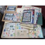 A Collection of World Stamps, early to modern, housed in six Junior albums, plus various