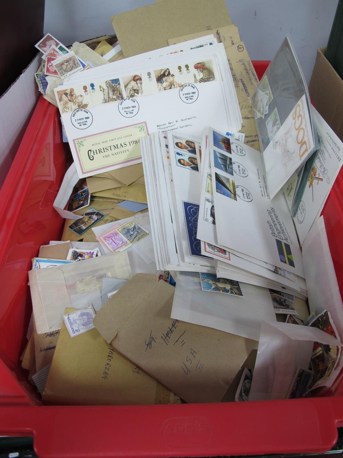 A Large Accumulation of Mainly Used World Stamps, in packets/envelopes and loose, thousands of