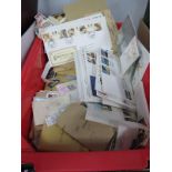 A Large Accumulation of Mainly Used World Stamps, in packets/envelopes and loose, thousands of