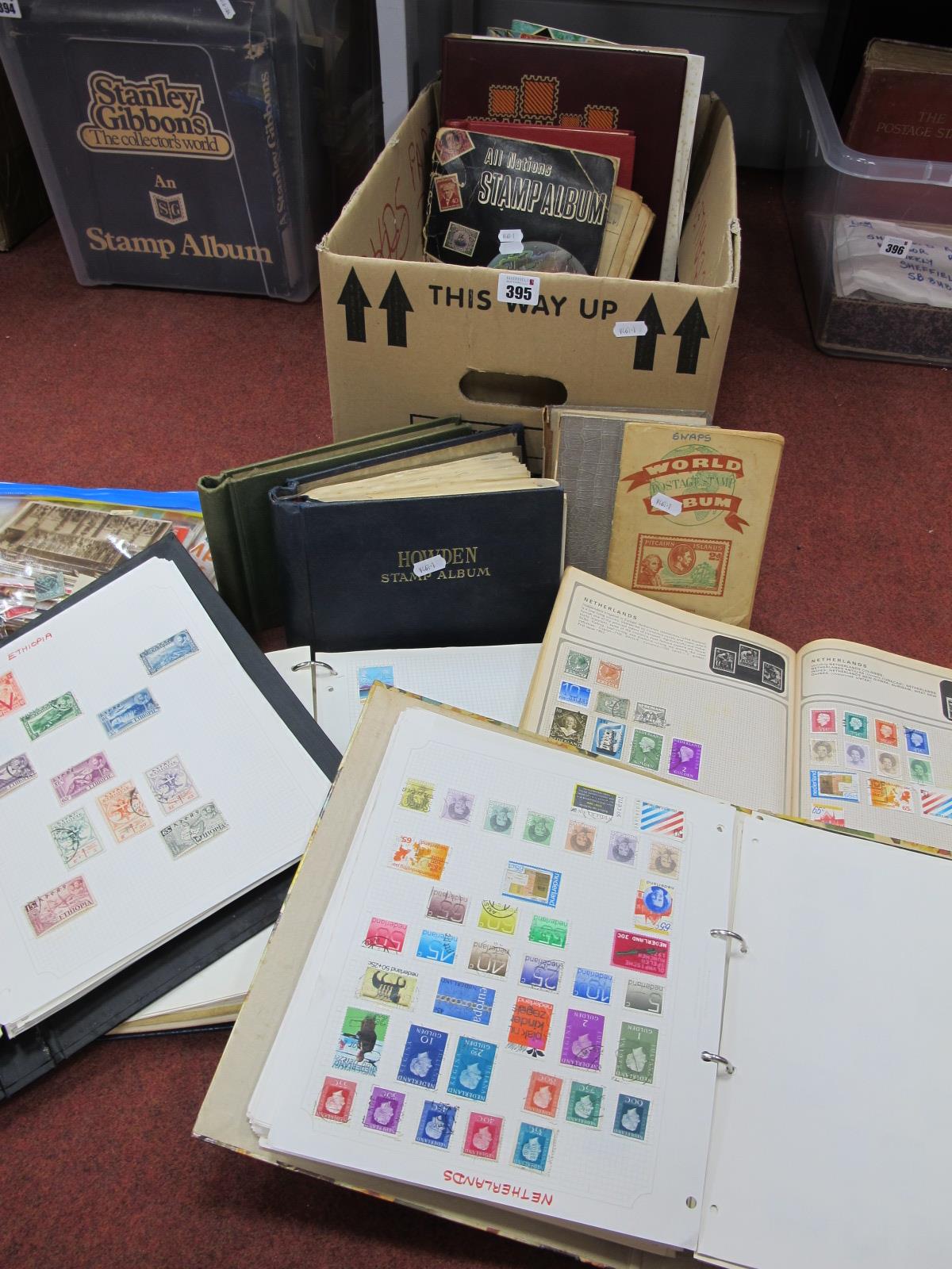 An Accumulation of G.B and World Stamps, in fourteen albums, plus a plastic bag of mint and used