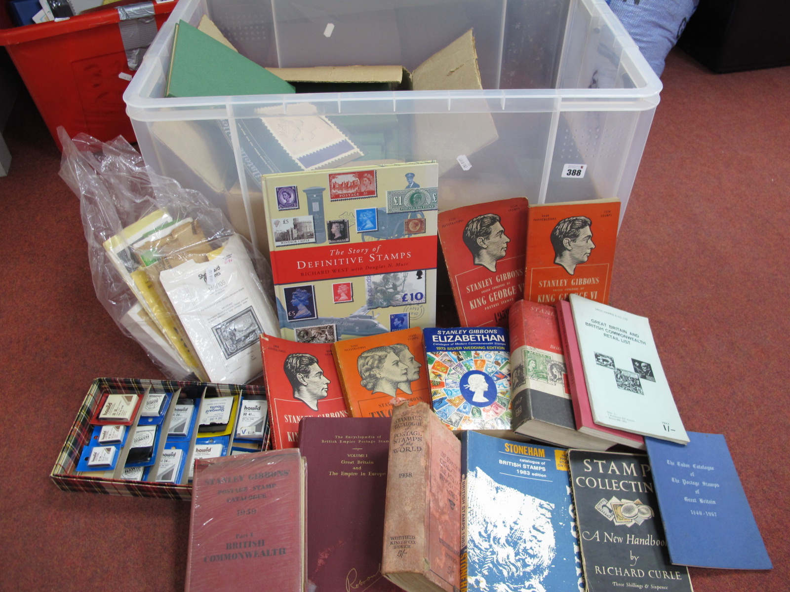 A Large Box Containing Philatelic Accessories and Publications, including 'The Story of Definitive