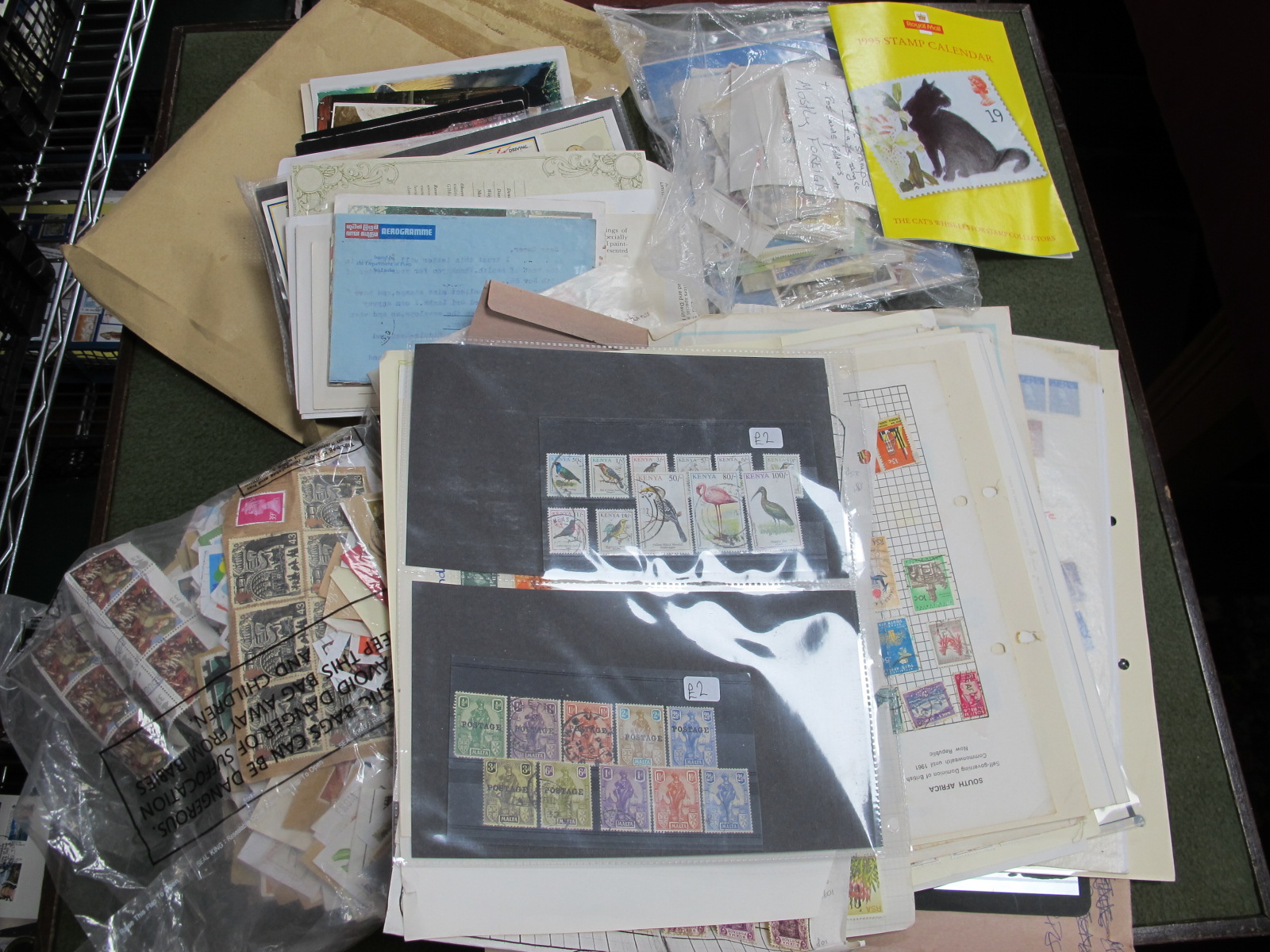 A Box of Mint and Used World Stamps and Covers.