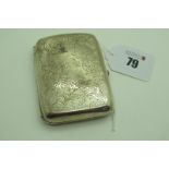 A Hallmarked Silver Cigarette Case, allover leaf scroll engraved and inscribed "G.R. Hill Dec