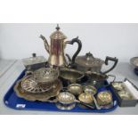 A Plated Three Piece Tea Set, a plain baluster coffee pot, tea strainers, pair of Nickel Silver