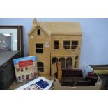 A Partly Constructed Dolls House, and a small amount of furniture and accessories.