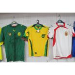 Football Shirts - Cameroon, by Puma circa 2008 size S. Gibraltar white by Hummel 2010-12. Jamaica