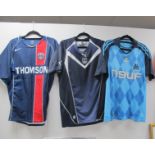 Football Shirts - Marseille, Adidas light blue with 'N9UF' logo. PSG Nike home 'Thomson' logo size