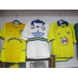 Football Shirts - Leeds United, Asics Home 'Thistle Hotels' logo size S, Puma yellow away '
