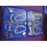 Assorted Modern Gilt Metal Costume Jewellery, including bangles, necklaces, chains, etc :- Two Trays