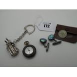 A Modern Novelty Golf Bag Keyring, stamped "925"; together with a small gun metal cased fob watch (