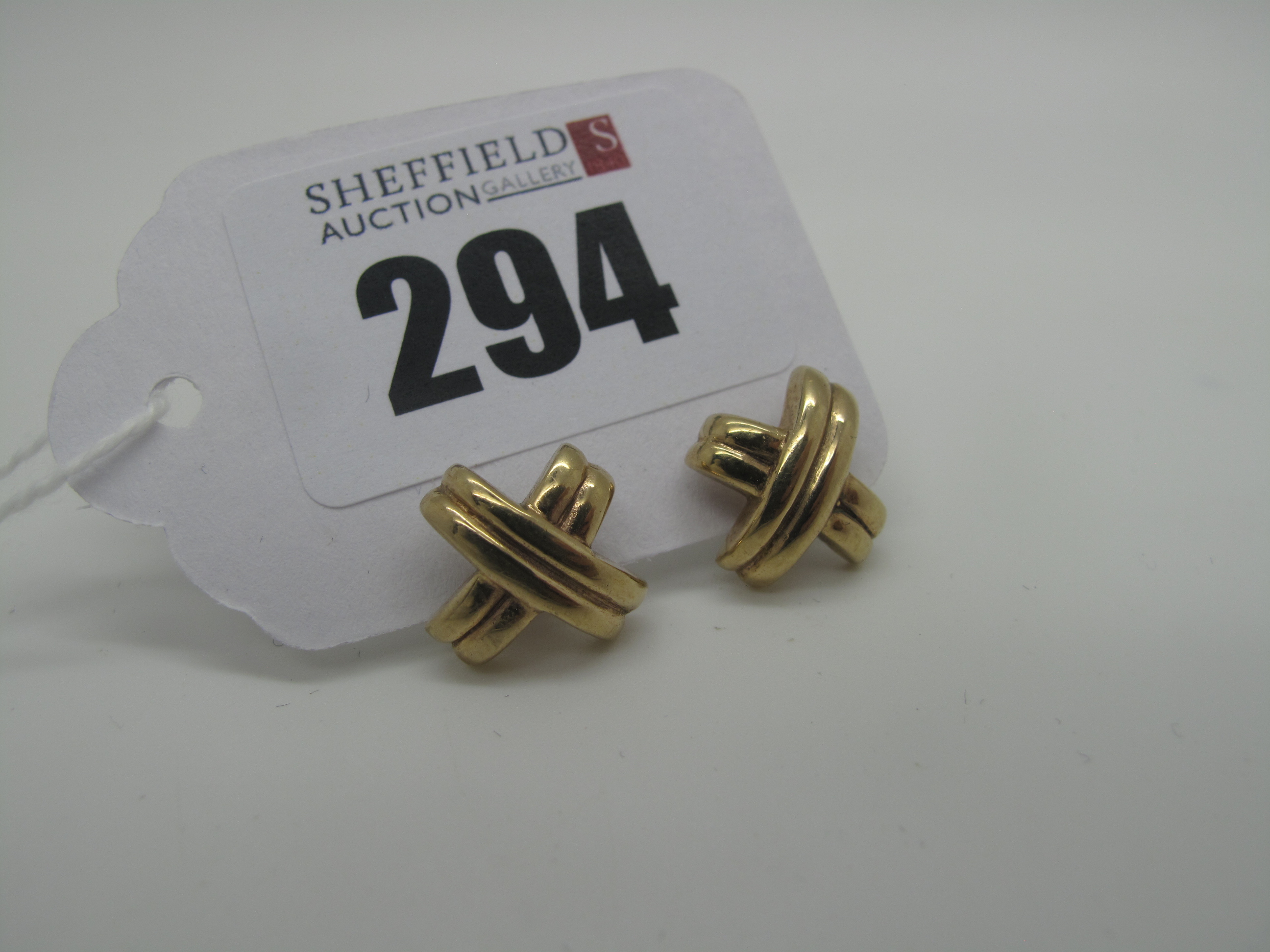 A Pair of Modern 9ct Gold Earrings, of cross design (4.5grams) (odd backs / one stamped "18k 750".