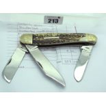 Stan Shaw Stock Knife, three blades, stag scales, n/s/ bolsters (etched by Peter Devine), brass