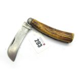 Pruning Knife; Alfred Blackwell,Sheffield, with brass flat bottom, stag scales, sharp clocks on