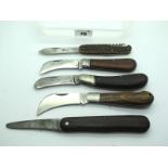 Five Unnamed Pocket Knives, four in wood scales, one with stag scales, various sizes, 13cm - 9cm.