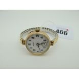 A 9ct Gold Hallmark (Rubbed) Cased Ladies Wristwatch, the signed Rolco dial with Arabic numerals,