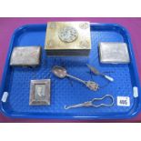 A Hallmarked Silver Small Rectangular Photograph Frame, a Chinese brass cigarette box with inset