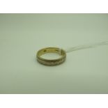 A 9ct Gold Patterned Band, (finger size N) (2.8grams).