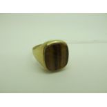 A 9ct Gold Signet Style Ring, the rectangular hardstone panel inset, between wide tapered