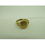 An 18ct Gold Signet Ring, the oval panel (worn) between tapered shoulders (finger size Q½) (6.8