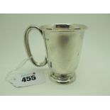 A Hallmarked Silver Christening Mug, Sheffield 1961. with large oval loop handle, overall height 7cm