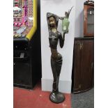 Floor Standing Bronzed Figure of African Girl Holding a Jug, on a circular base, 127cm high.
