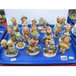 Hummel West German Figures, including boys and girls with viola, lute and other instruments, on