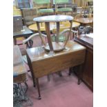 A XX Century Mahogany Drop Leaf Table, on tapering legs, spade feet, together with a mahogany coffee