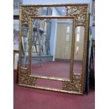 Gilt Rectangular Wall Mirror, with pierced corners, with scroll decoration centre, bevelled glass