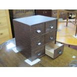 A Circa 1930's Table Top Filing Cabinet, with metal loop and label handles to the two banks each