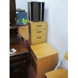 Three Filing Cabinets; together with a C.D rack. (4)