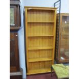 Julien Bowen, pine bookcase, with four selves, on bun feet, 76cm wide x 184cm high.