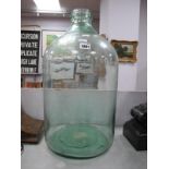 Tall Green Glass Display/Storage Bottle, circa early XX Century 52cm high.