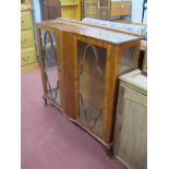 XX Century Walnut Display Cabinet, with a low back, glazed doors and sides, on cabriole legs.