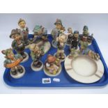 Twelve Hummel Figures, including Clown, Tyrolean Boy, Boy with Frog ashtray, Girl with Toothache,