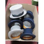 WITHDRAWN Seven Windmill Textile Marketing Top Hats, five in navy blue, two in grey.