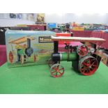 A Boxed Mamod Live Steam T.E.1A Traction Engine, accessories include scuttle, burner, some paint