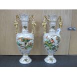 A Pair of Phoenix Ware English Pottery Vases, each with gilt rams head handles, multicoloured images