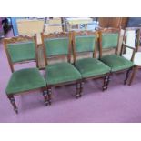 A Set of Four Early XX Century Stained Mahogany Dining Chairs, with upholstered back panel seat,