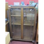 1920's Oak Display, with glazed doors, on cabriole legs, 88cm wide.