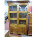 Bookcase, display cabinet with six glazed doors, over two panelled cupboard doors, panelled sided,