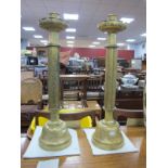 An Impressive pair of Ecclesiastical Candlesticks, stepped wax catchers, circular shafts with