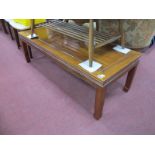 Chinese Hardwood Rectangular Shaped Coffee Table, with a panelled top, on shaped supports, 127cm